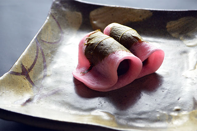Sakura-mochi (rice cake with bean paste wrapped in a preserved cherry leaf)