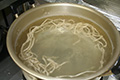 Add cold water twice while boiling the noodles.
