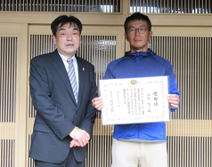 水野陽一氏(右)と佐土原地方参事官