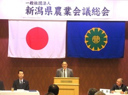 北陸農政局長祝辞を代読する齊官地方参事官