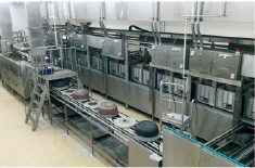 どんどんライスの加工工場内にある炊飯ライン